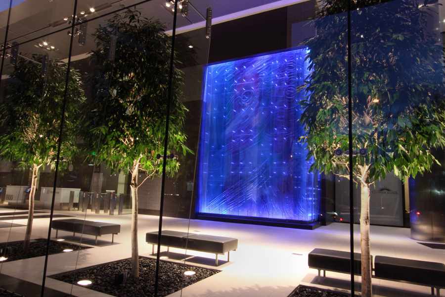 Glass sculpture in lobby with changing colored backlight :  : Christopher Davies Photography